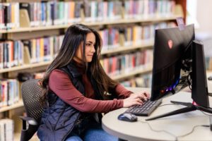 Student on a computer doing homework