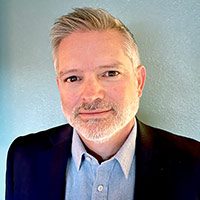 Headshot of John Arnold