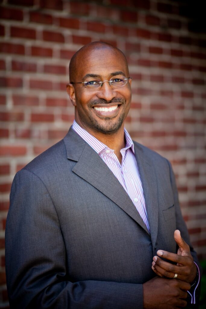 VanJones headshot Grey Suit brick wall background