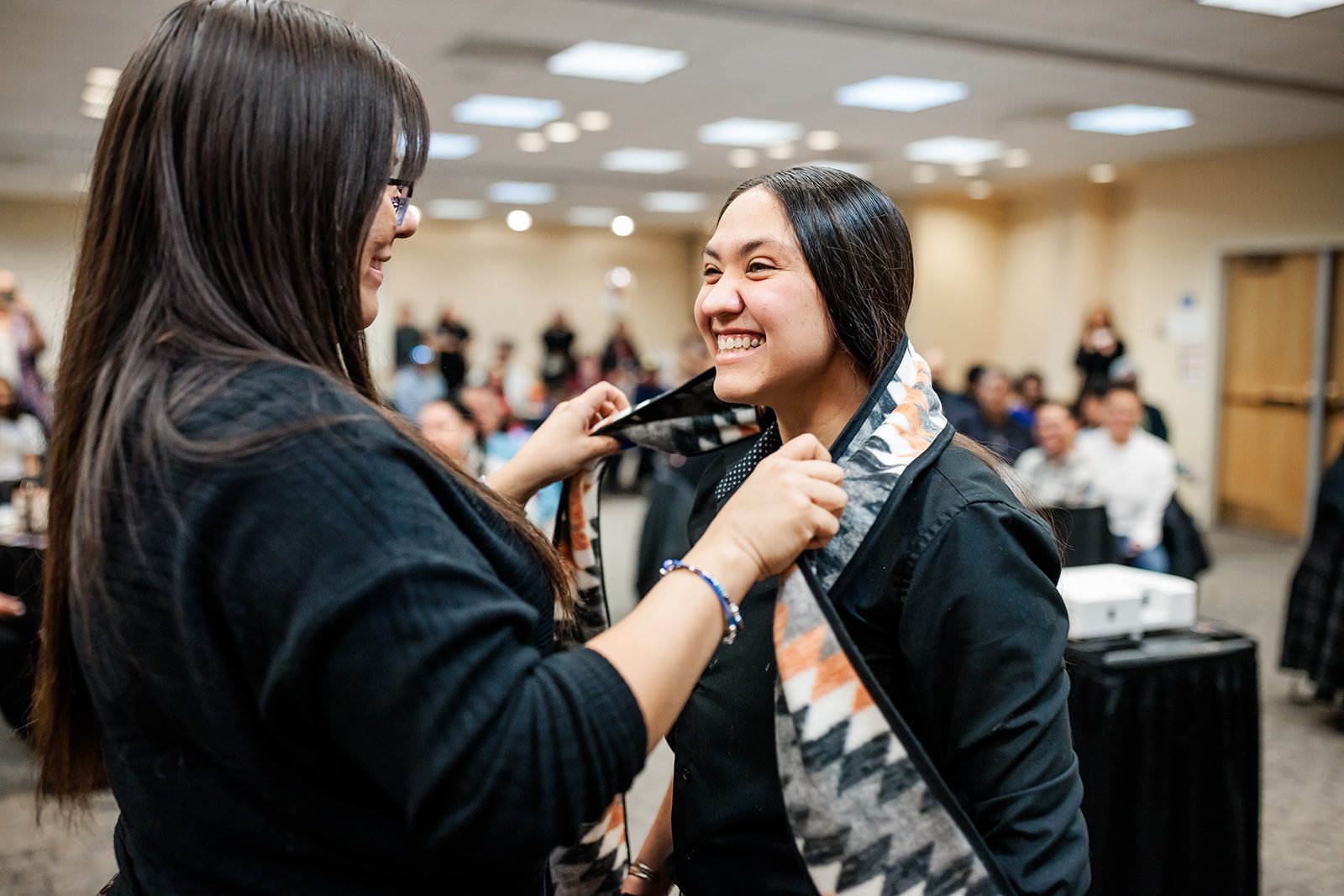 Student receiving stole at Native Indigenous Graduation