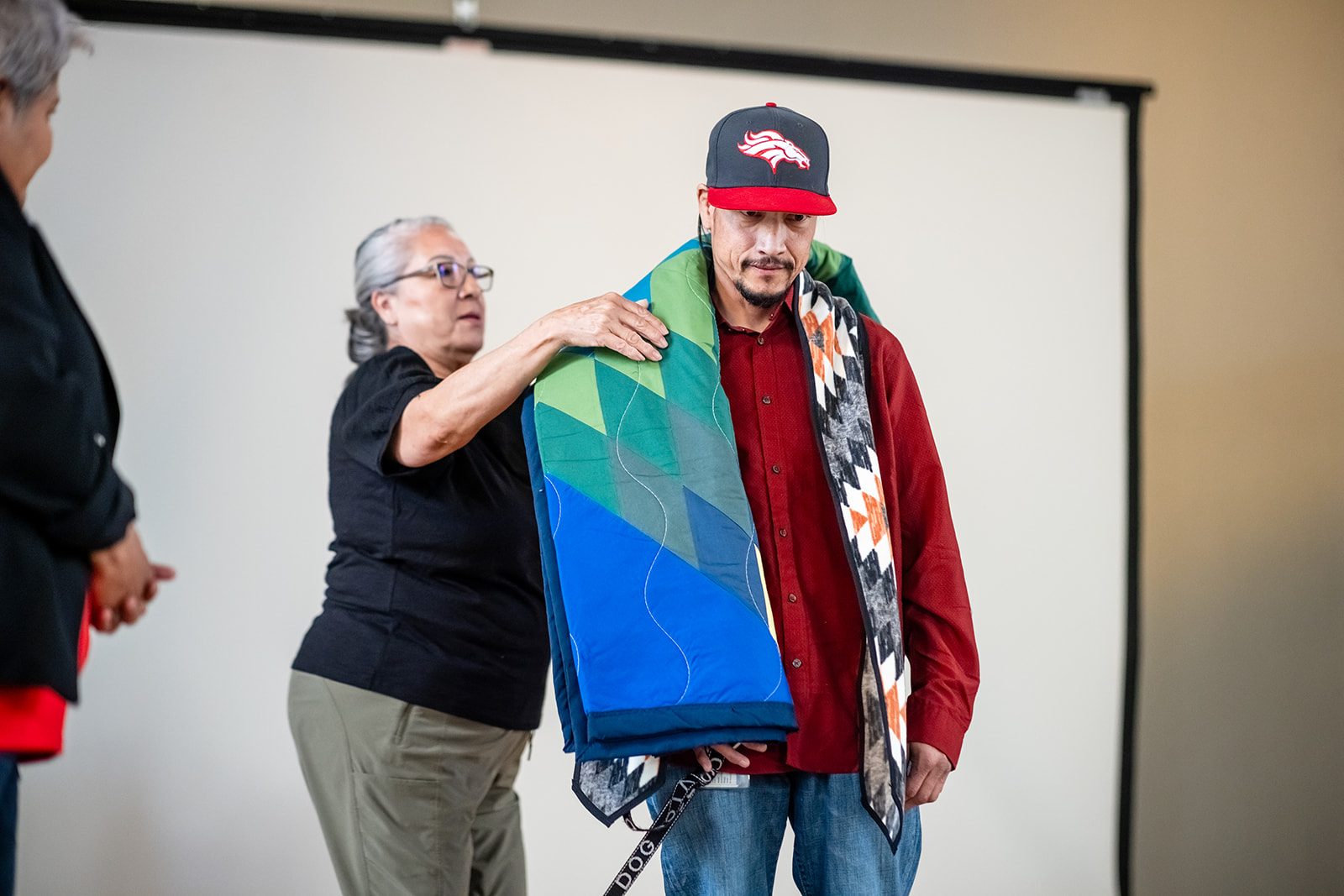 Student receiving a blanket