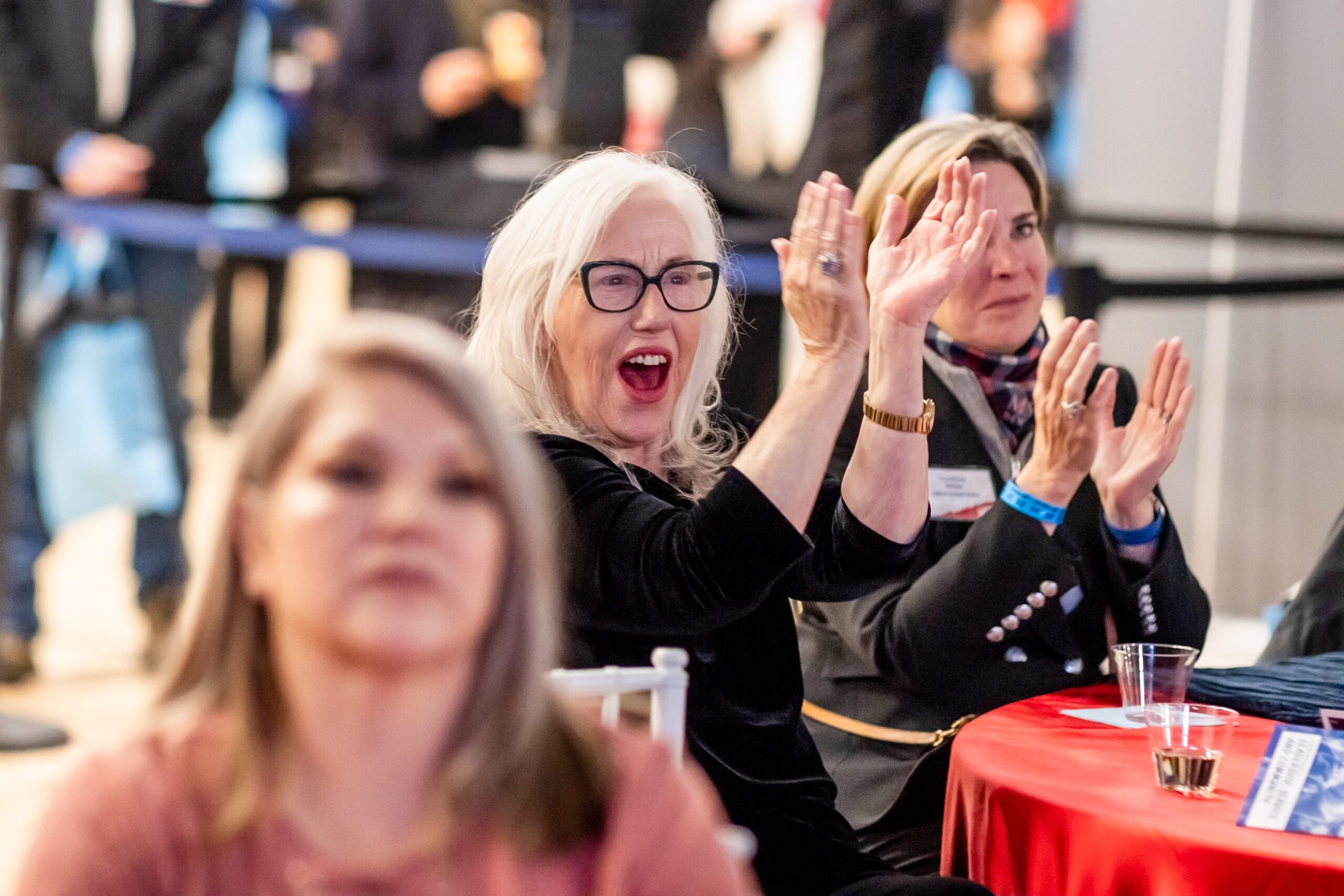 Barb Grogan cheering at Roadrunners Rise Campaign Launch event