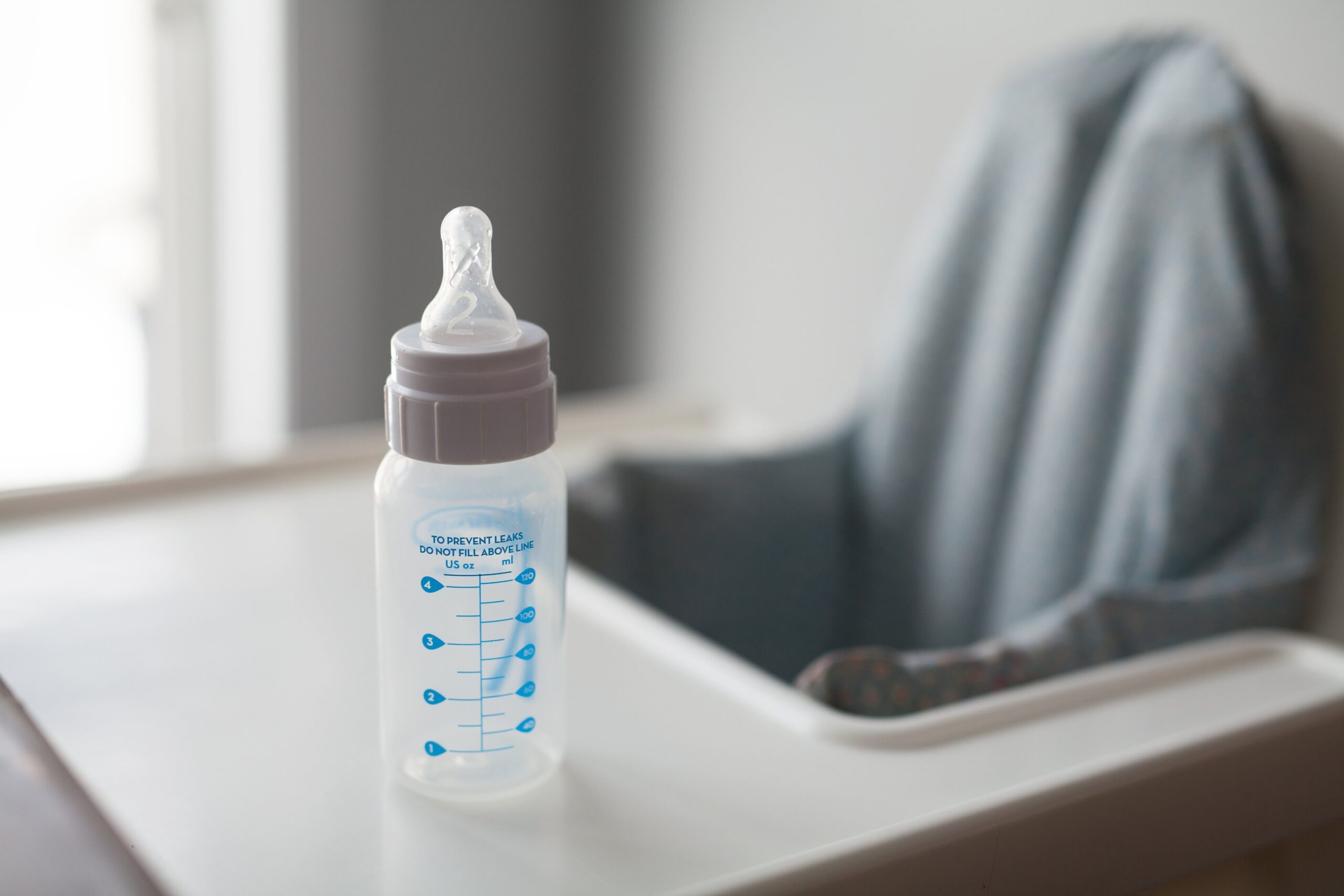 A photo of an empty bottle used to feed infants