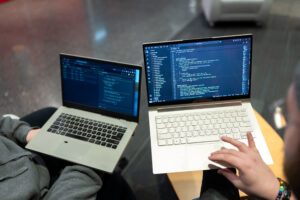 Laptop with code on the screen.