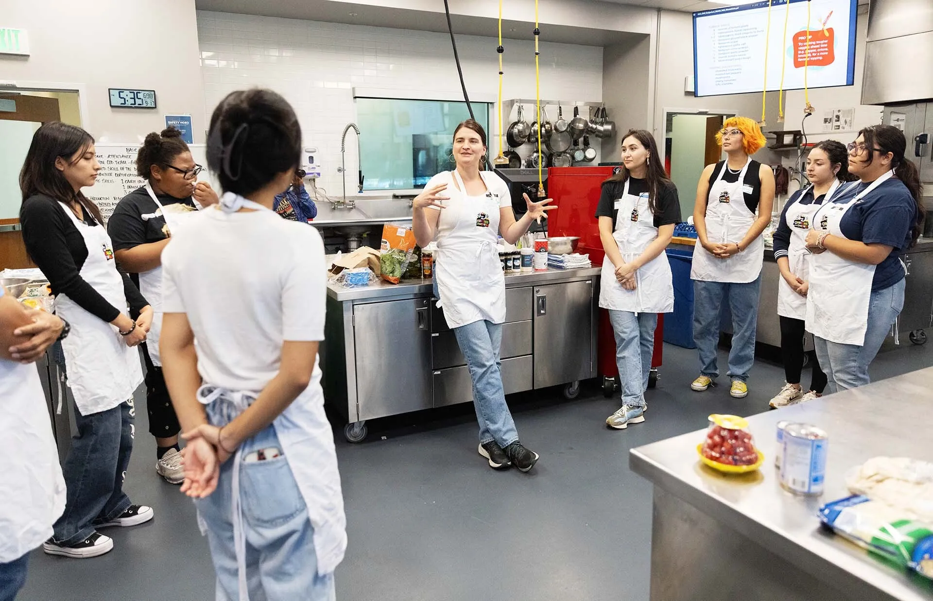 Natalie Nowak, registered dietician at the Health Center at Auraria, leads the Cooking with Purpose class held in partnership with Rowdy’s Corner.