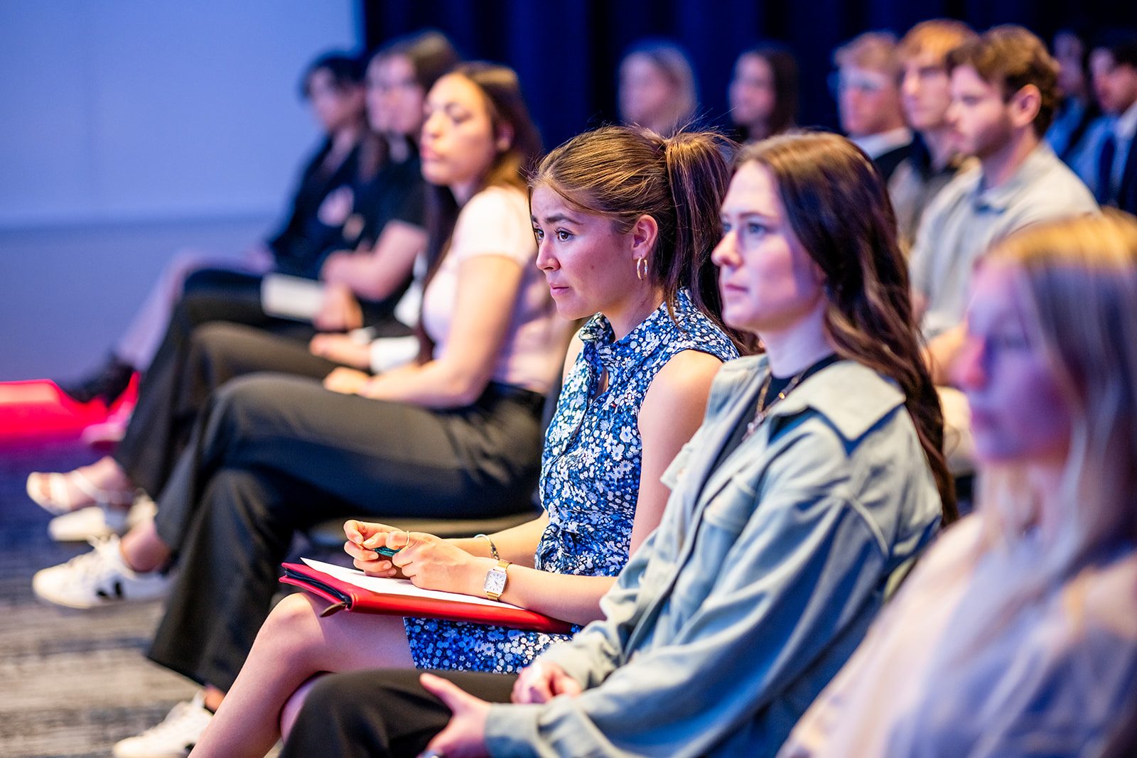 Students sitting at the panel presentation