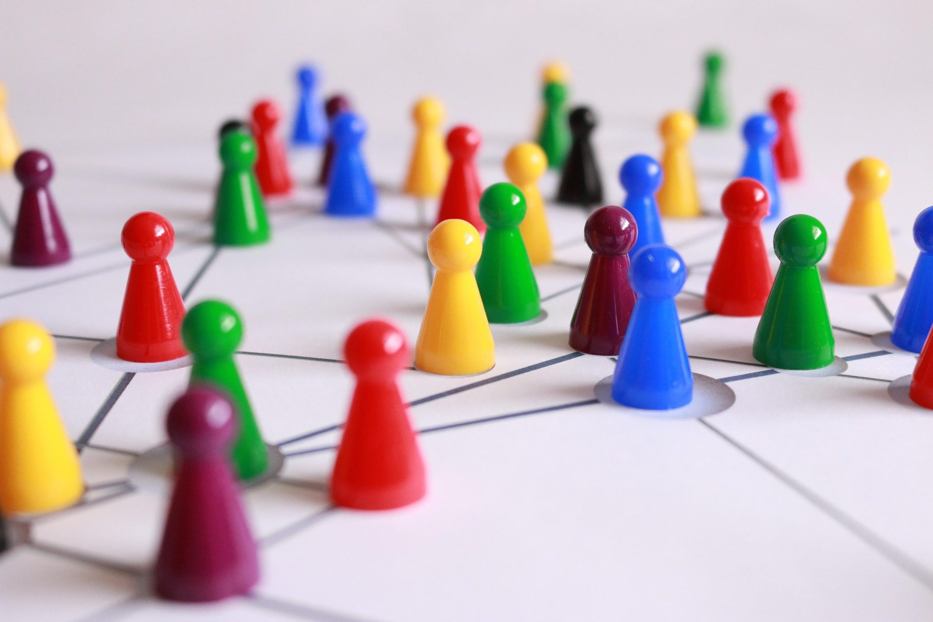 colorful game pieces networked by lines