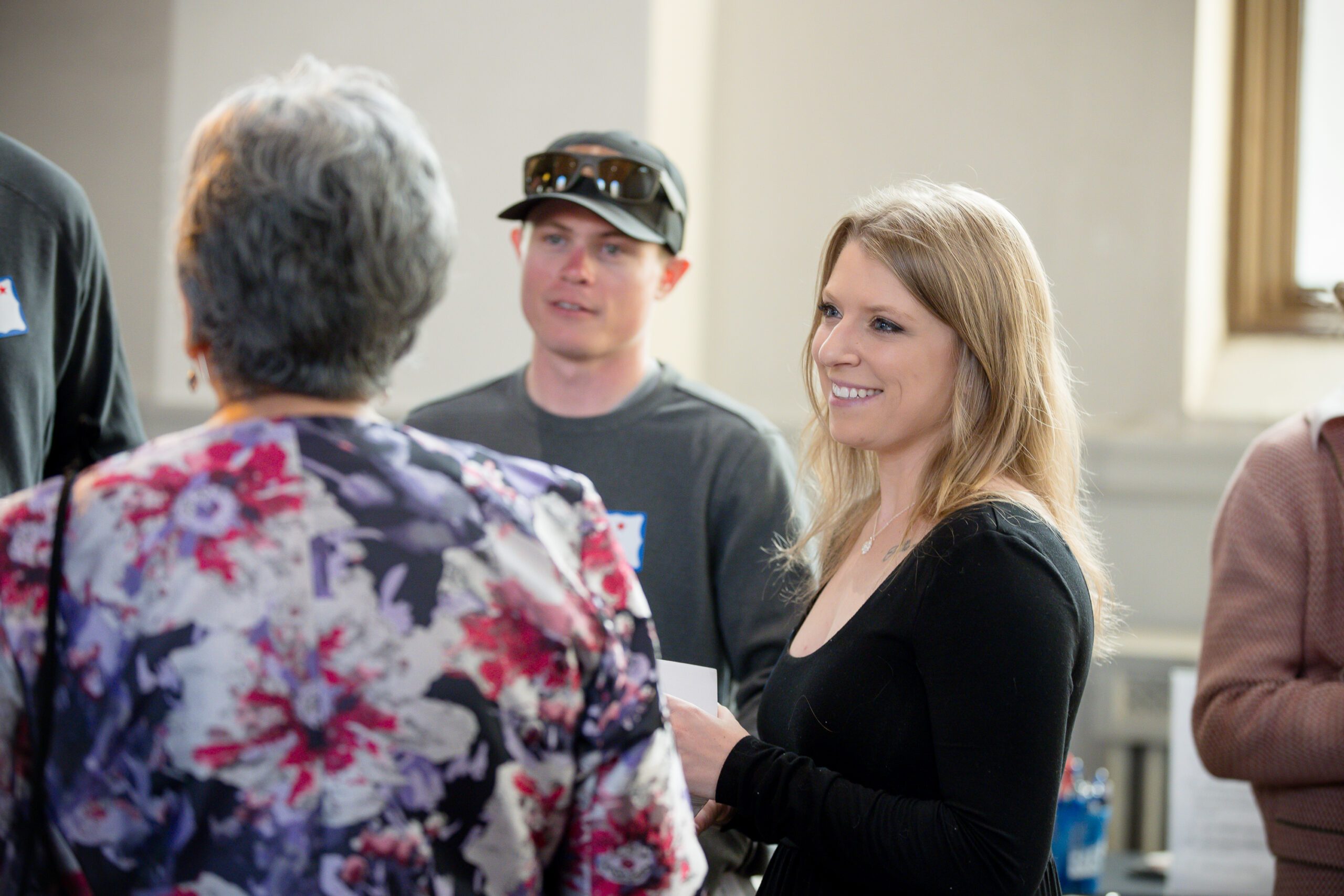 small group of alumni talking with a faculty before the program begins - MSU Denver MPAcc's 15 year anniversary event