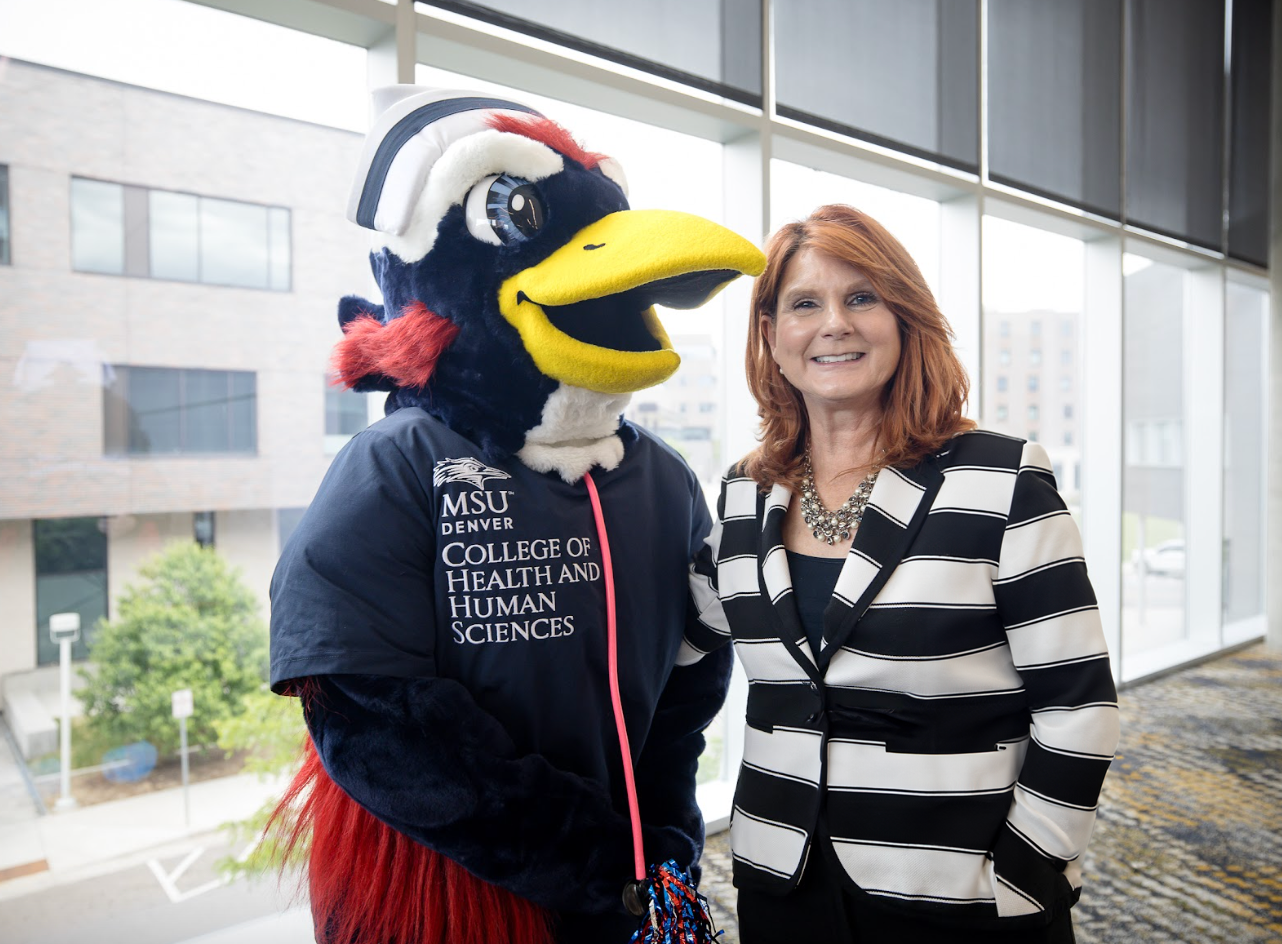 Nurse Rowdy (left) and CHHS Dean Hope Szypulski celebrating at the 2025 Outstanding Student Awards in the SpringHill Suites. Photo: Sara Hertwig
