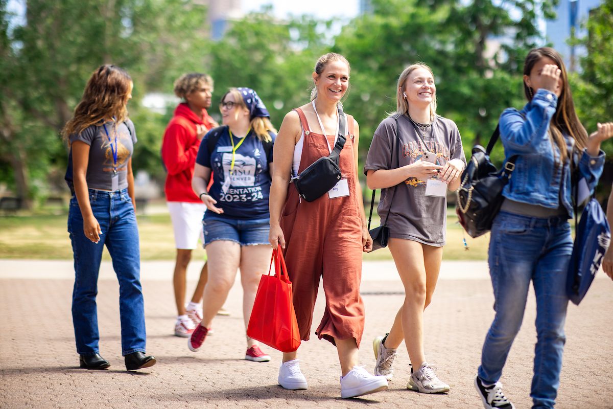 Group of people walking around outside