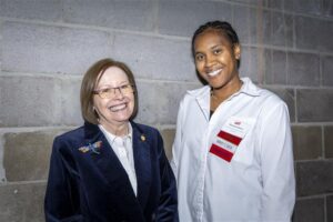 Two people posing for a photo at the Zonta Club Scholarship dinner