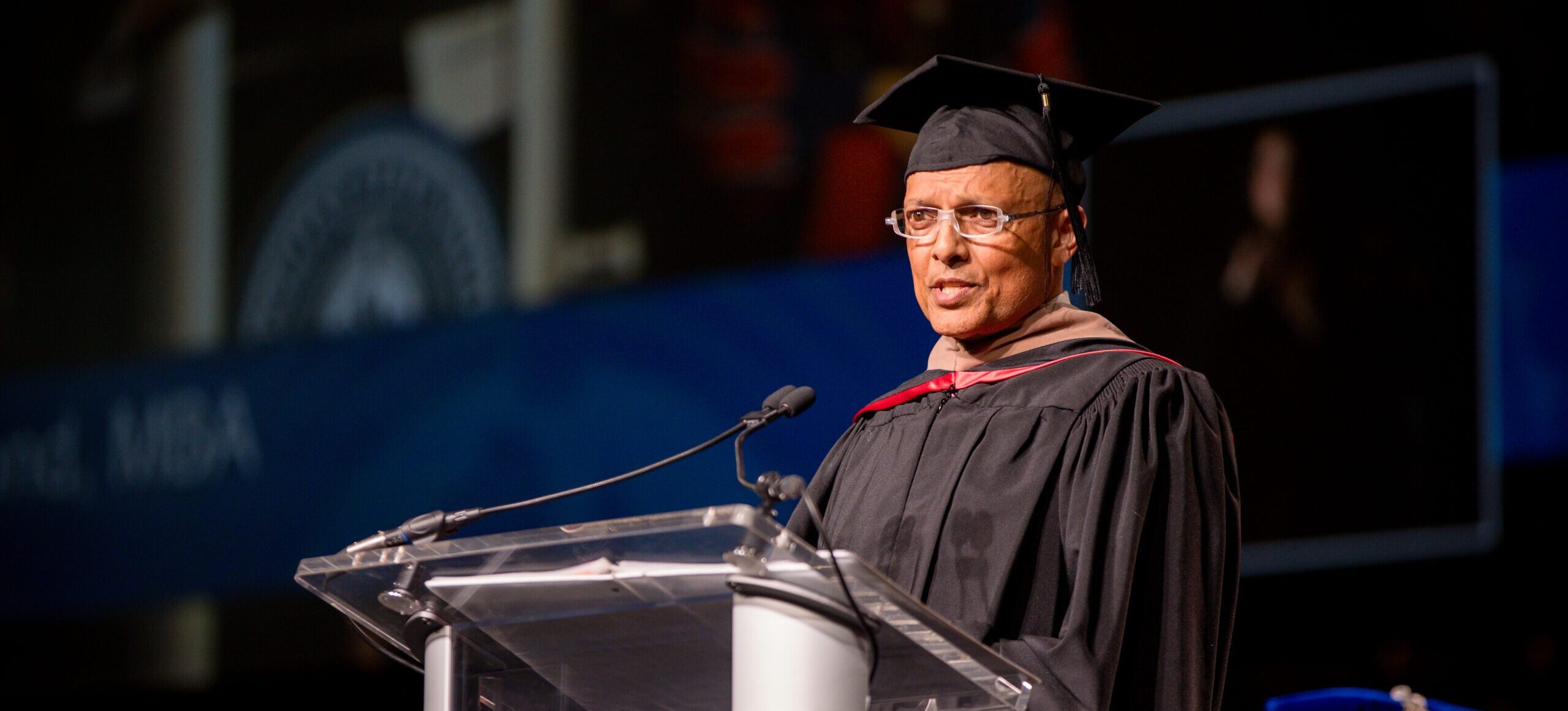 Marathon Award winner giving speech at commencement Ceremony.