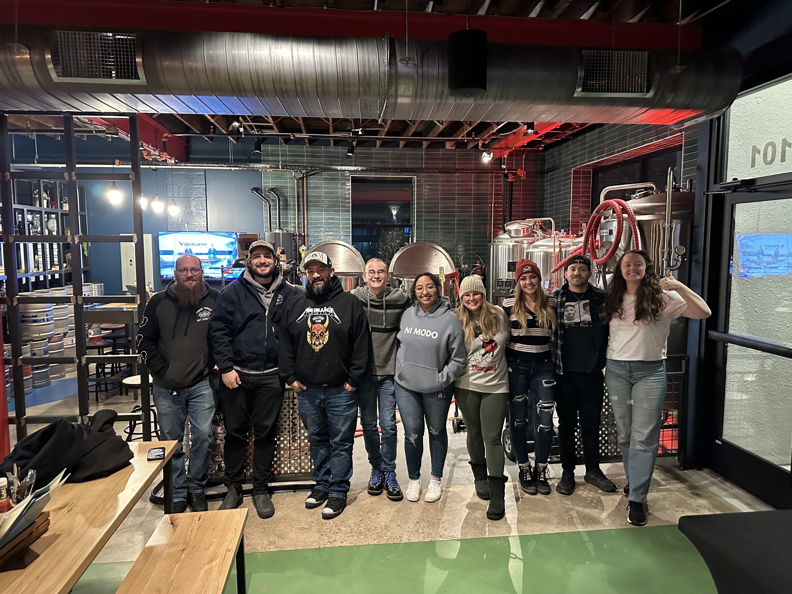 school of hospitality student club members at a local brewery