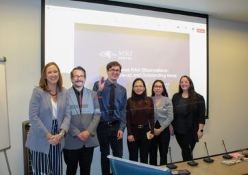 Accounting students presenting in front of MSU Denvers president and cabinet members