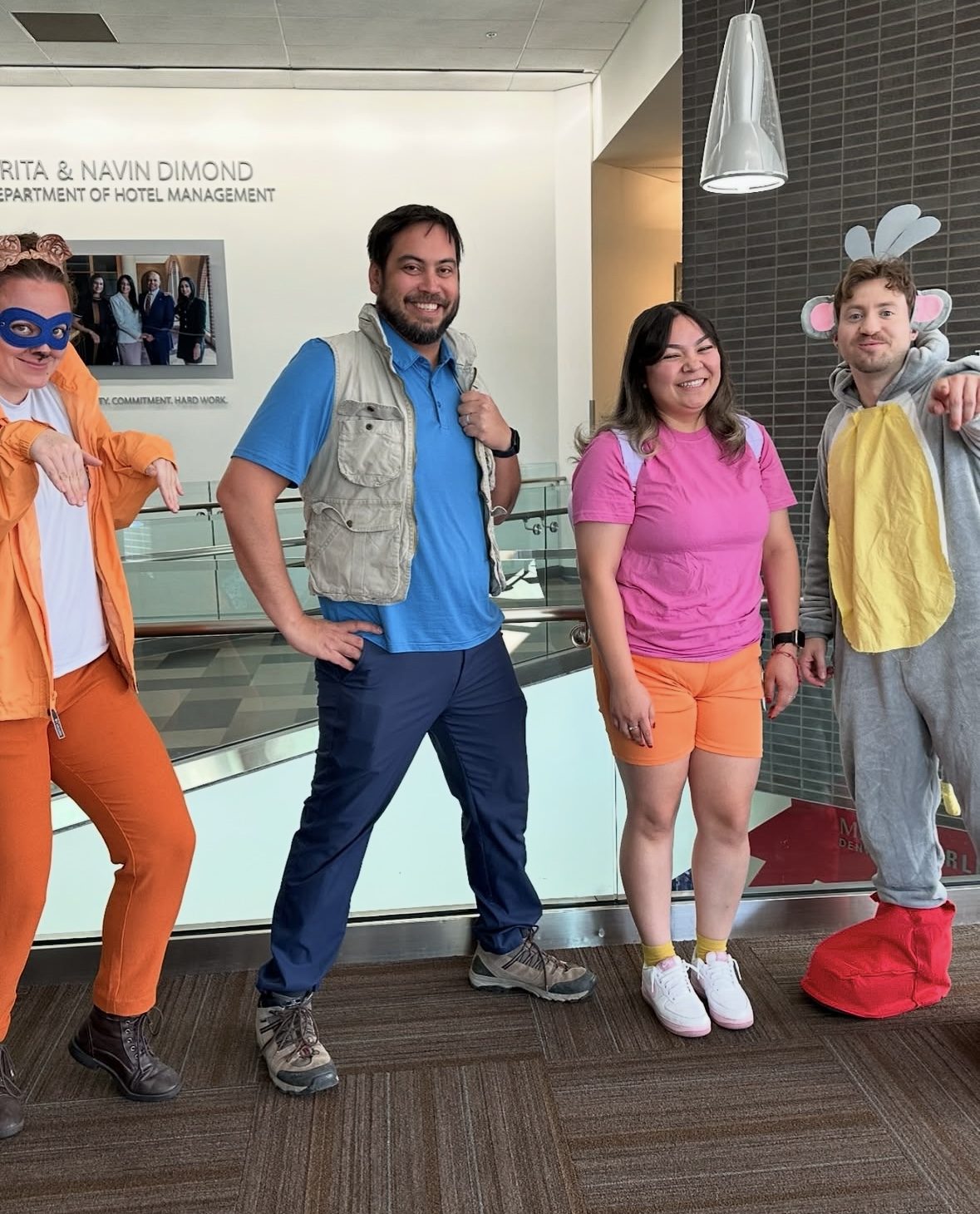 school of hospitality staff dressed up as dora for halloween