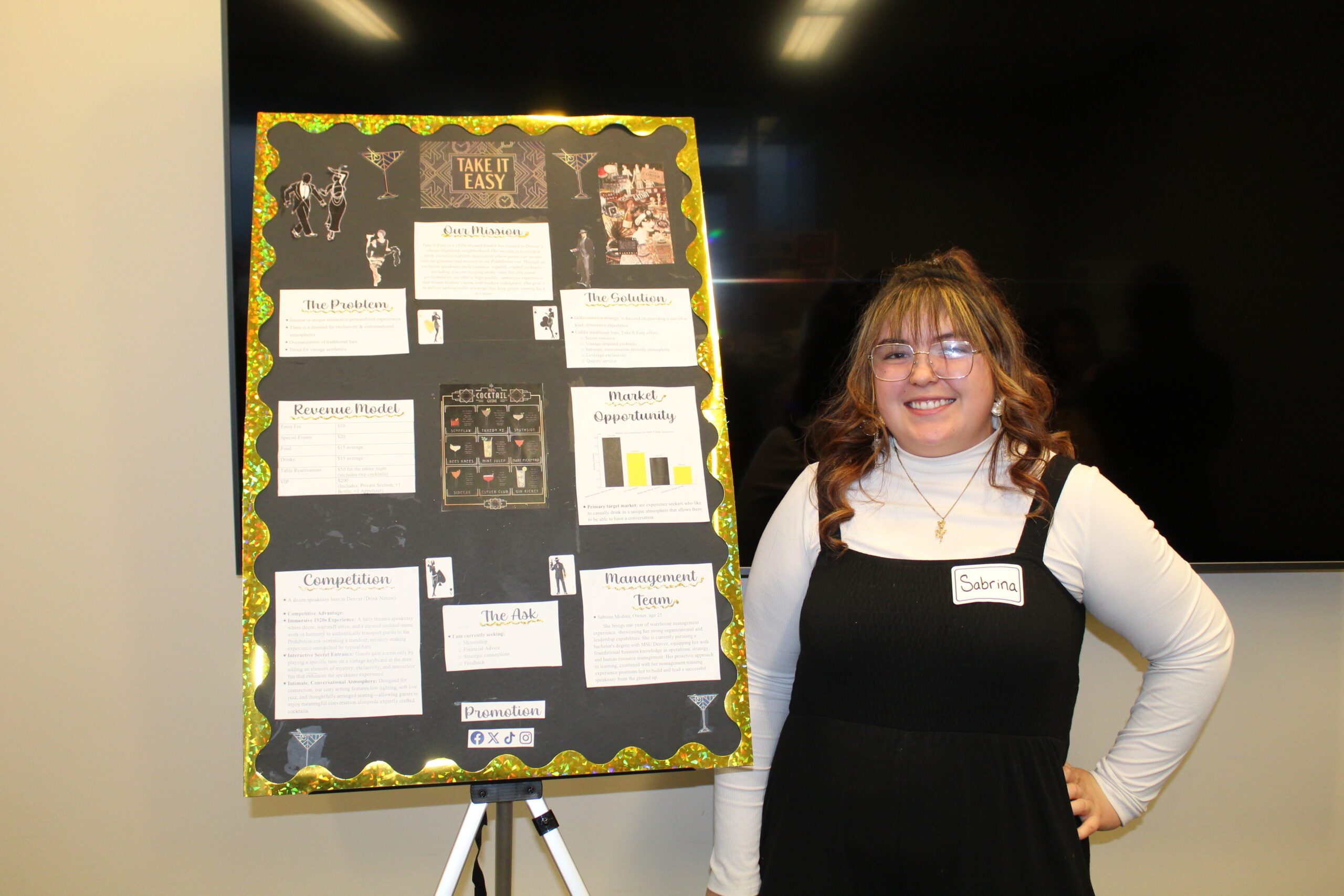 Sabrina Showing her Poster At Pitch and Poster Competition