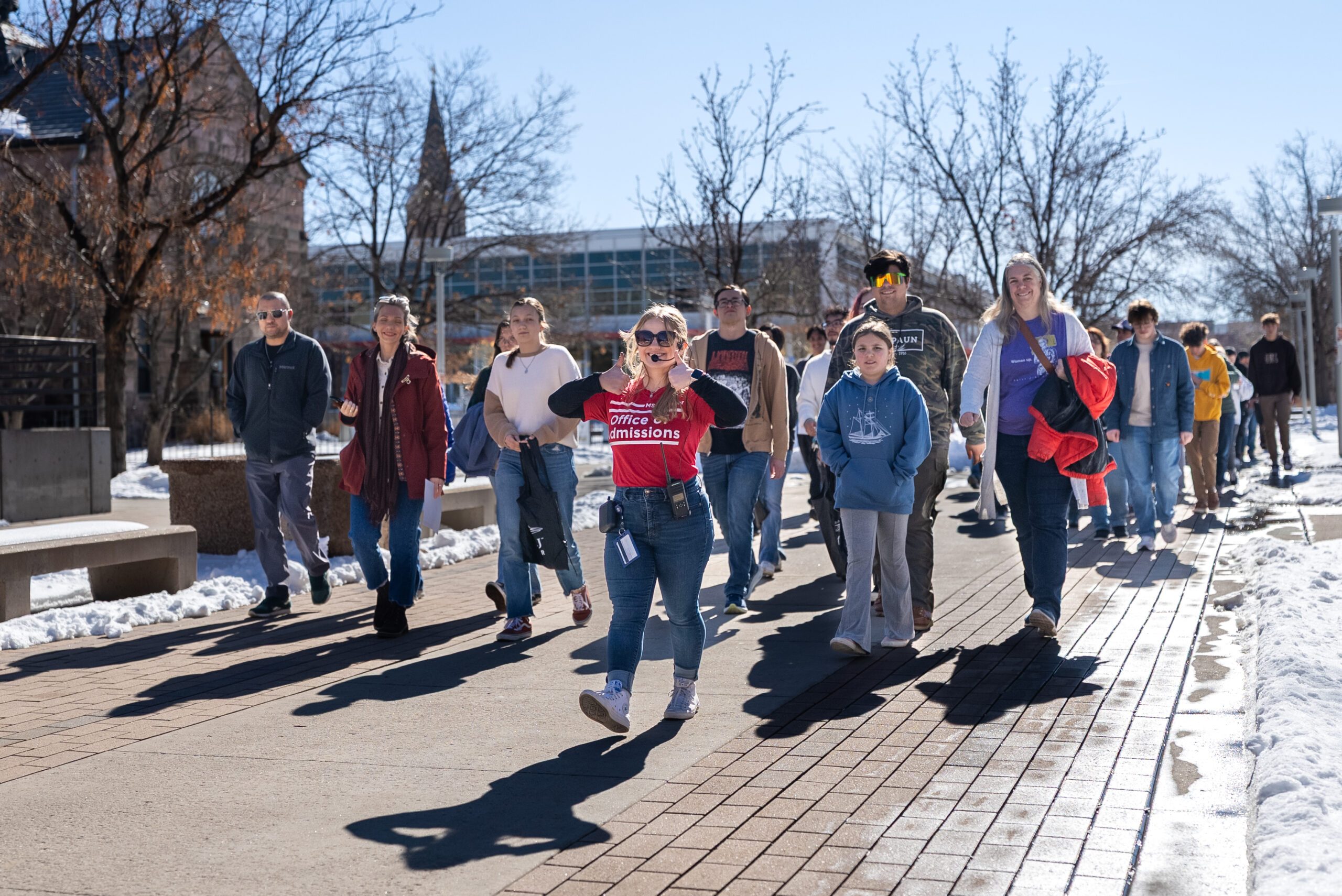 MSU Denver student giving a campus tours to new students.