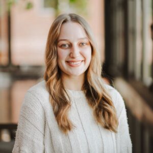 Photo of Heather Kemp in front of a building