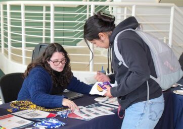 Clare Fidler Helping a student