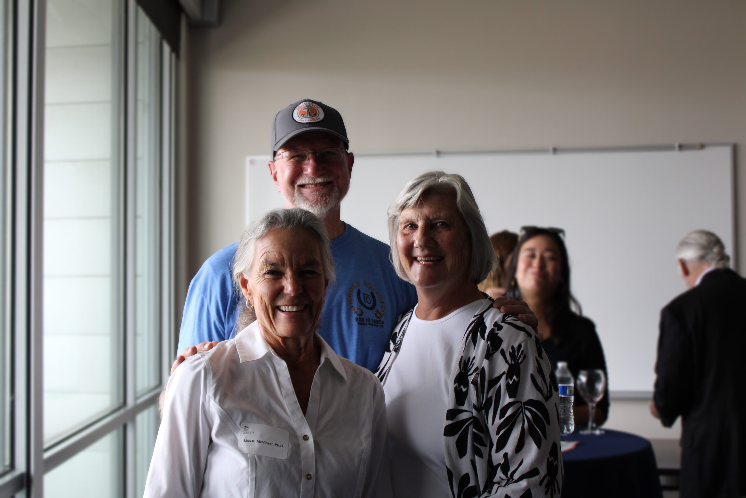 People posing for a photo at Ann Murphys retirement party