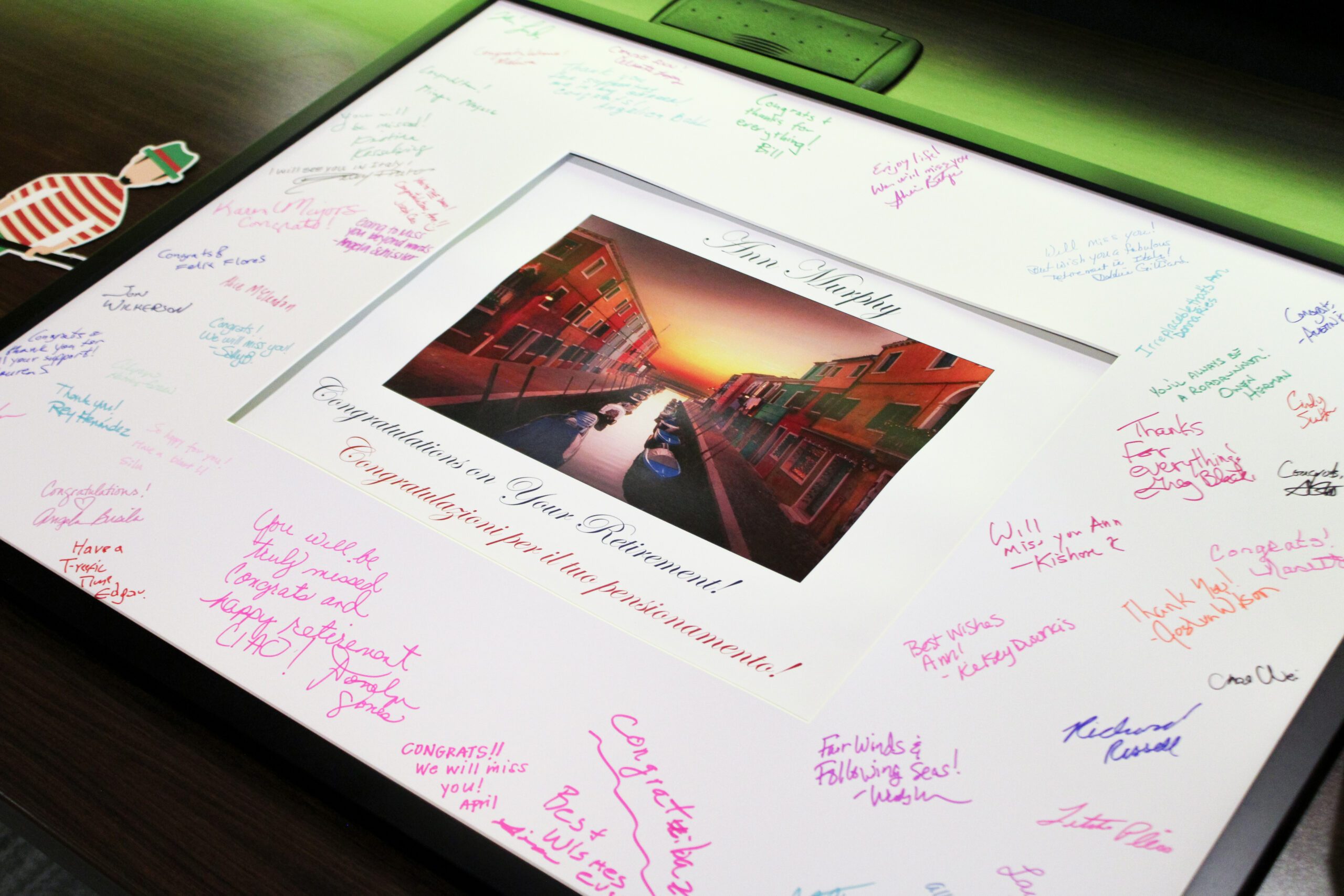 Photo of a signed picture at Ann Murphys Retirement party