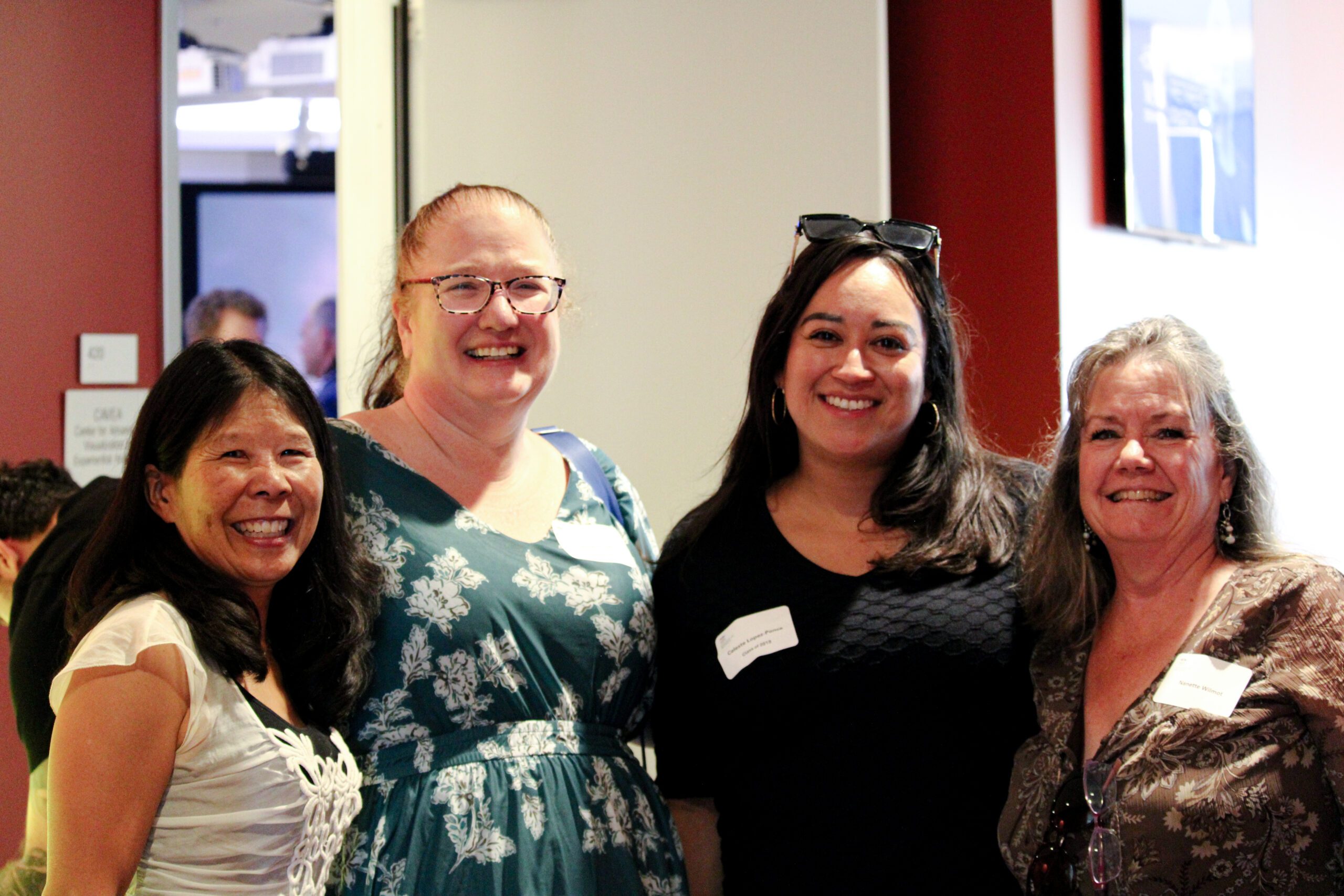 People posing for a photo at Ann Murphys retirement party