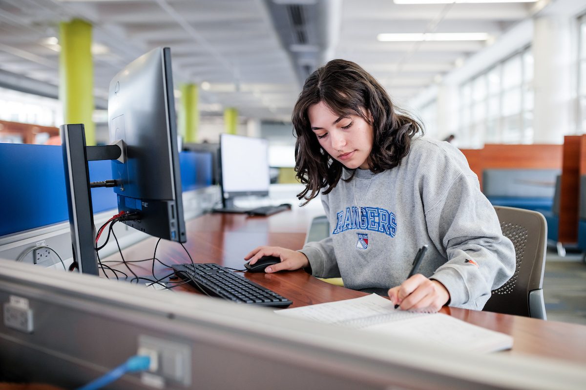 MSU Denver student studying on a computer