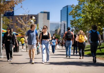 students walking on campus near Tivoli
