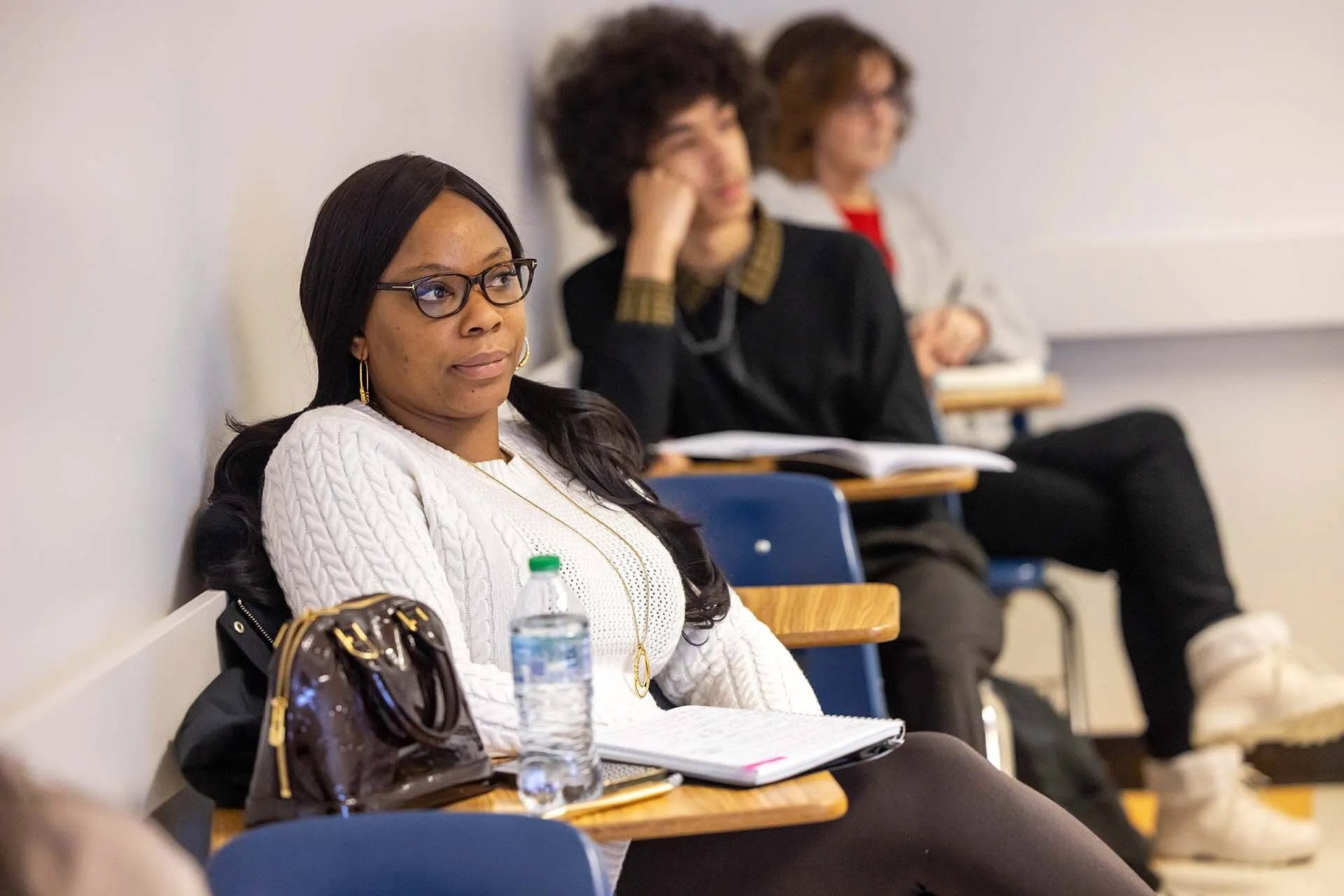 MSU Denver student Stacy Berry listens during the first Intro into Affordable Housing class during the spring 2025 semester. Photo by Amanda Schwengel