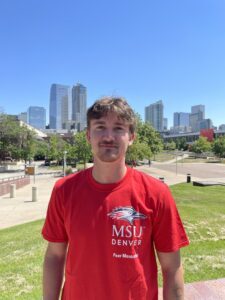 Photo of Carsen in front of Auraria campus