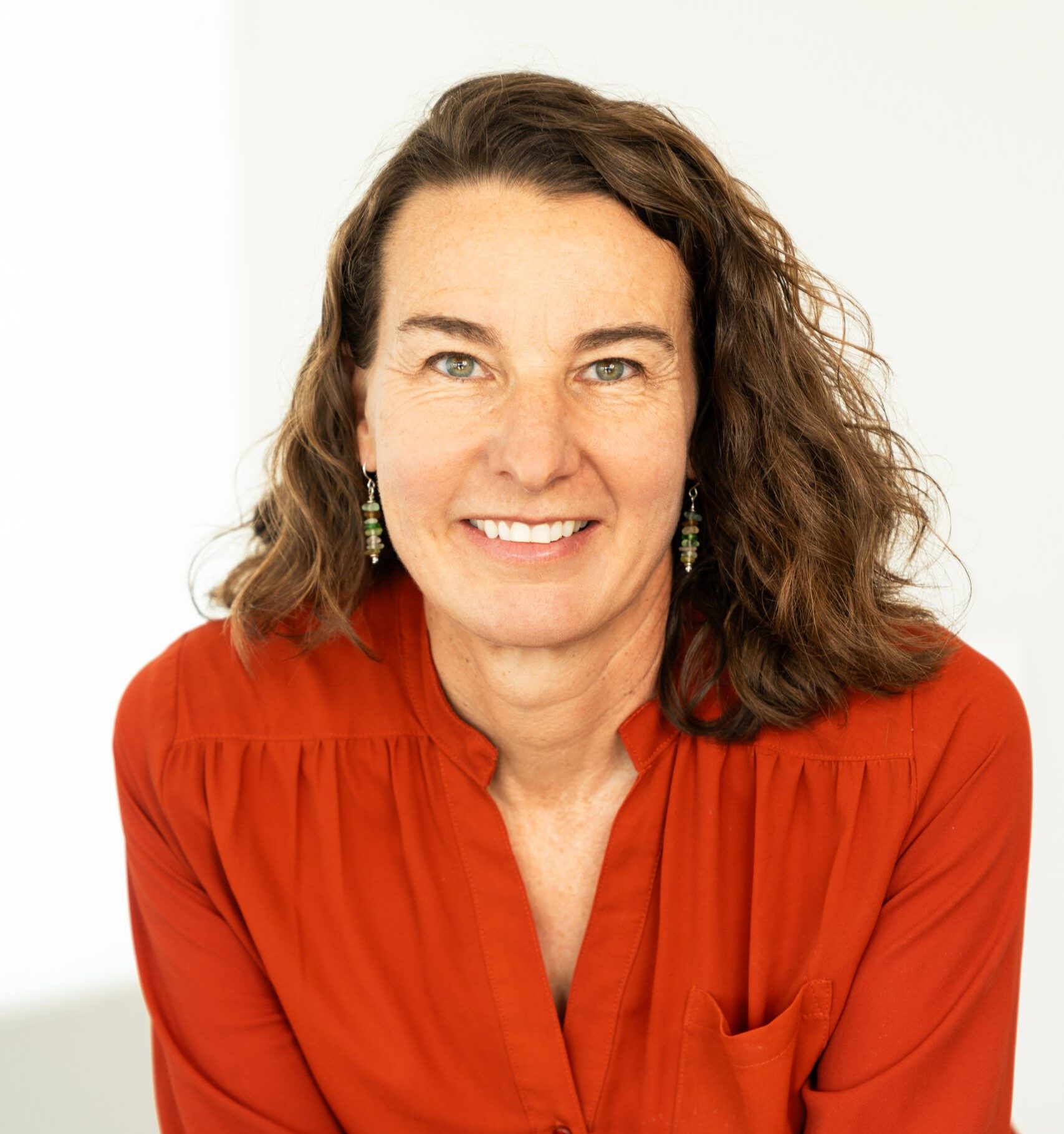 Headshot of Director of the FORWARD initiative at the Public Education and Business Coalition (PEBC), Founder of The Third Mile Group Katy Anthes