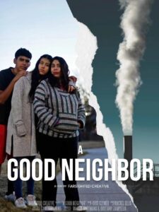 Poster for the film A Good Neighbor showing a woman and two children standing together on the left side, looking serious. A torn-paper effect divides the poster, with the right side showing smoke rising from an industrial smokestack. The title “A Good Neighbor” is displayed across the bottom.