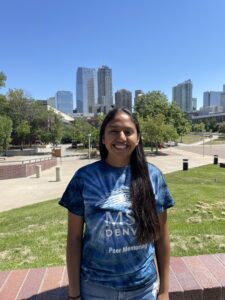 Photo of Maria in front of Auraria campus