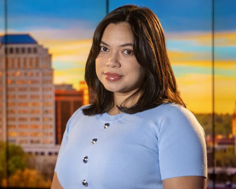 A young woman with shoulder length brown hair
