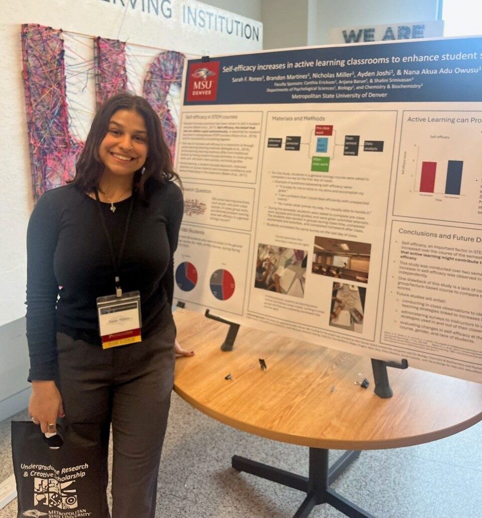 Sarah Rones presents a poster at the Undergraduate Research Conference.