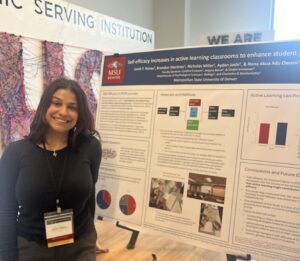Picture of Sarah Rones presenting a poster