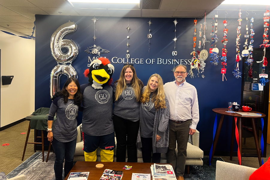 College of Business staff with Rowdy