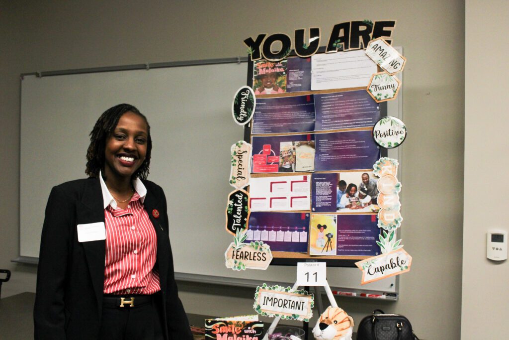 poster winner Juliet Odour for the business pitch and poster competition 