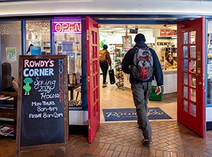 Student enters Rowdy's Corner in the Tivoli Student Union