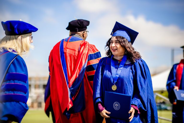 picture of graduate student and faculty