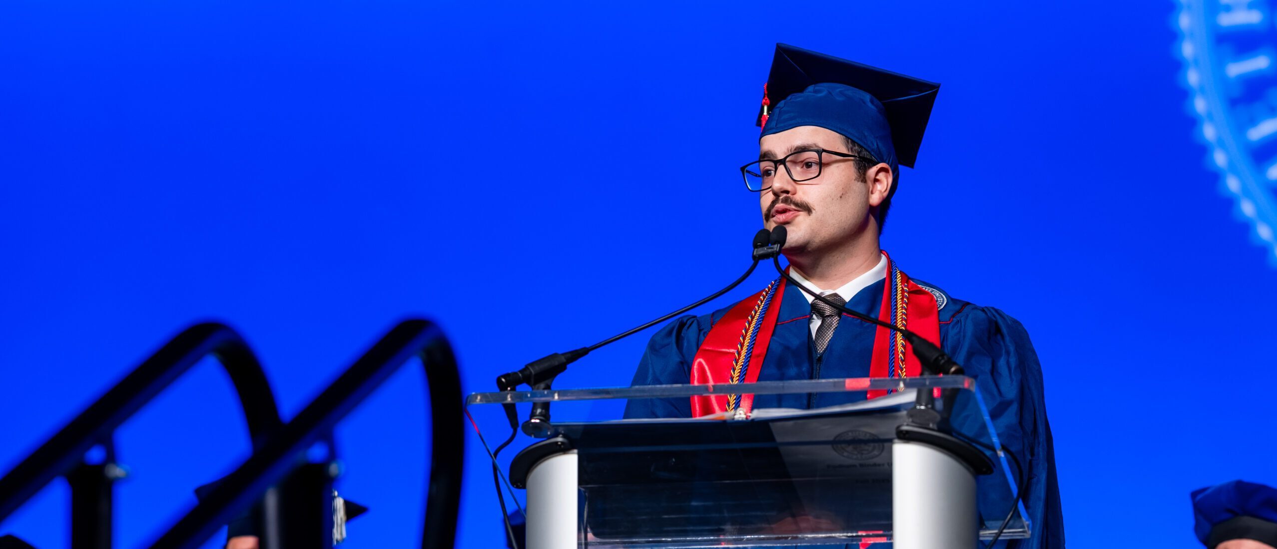 Samuel Lynch speaking during the Fall 2025 Morning Commencement