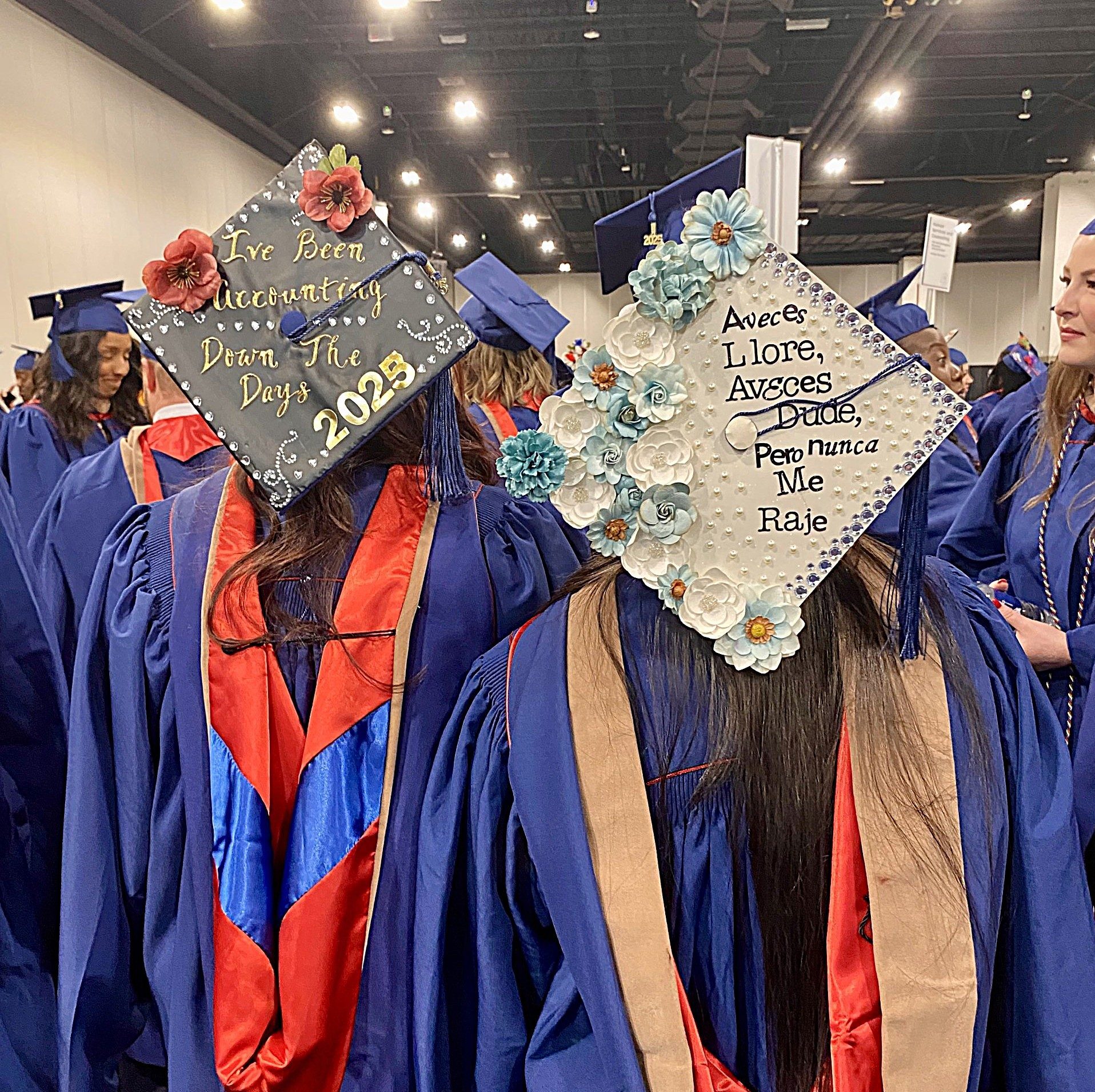Fall '25 Commencement Cereomny - 2 MPAcc grad decorated caps