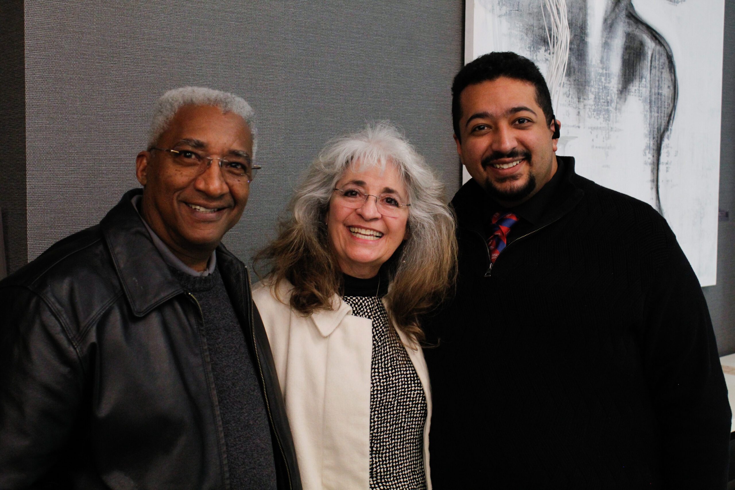 Fall '25 MBA & MPAcc Hooding Celebration - MPAcc grad, Leo, smiling with family before program