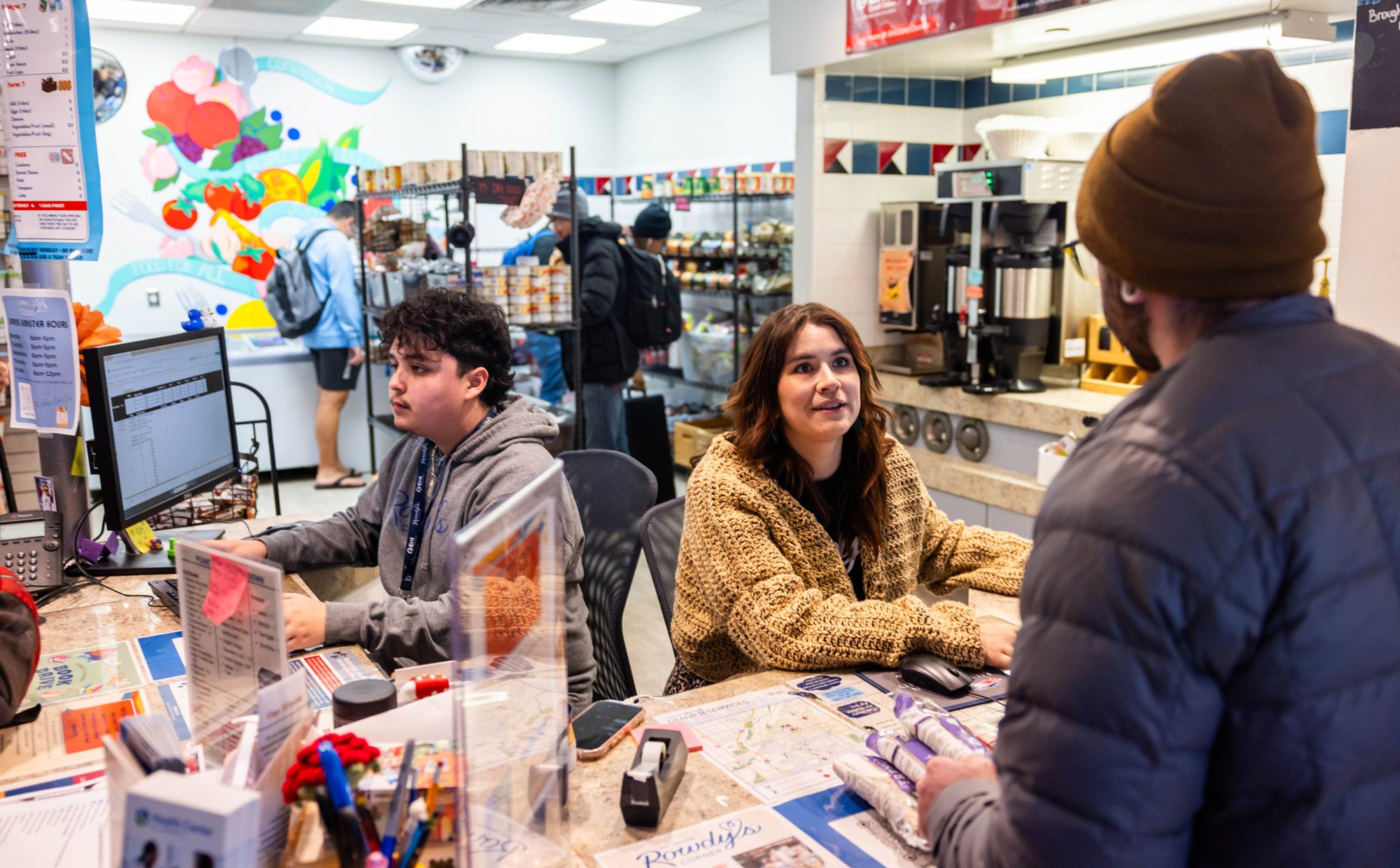 A student at the checkout counter in Rowdy's Corner