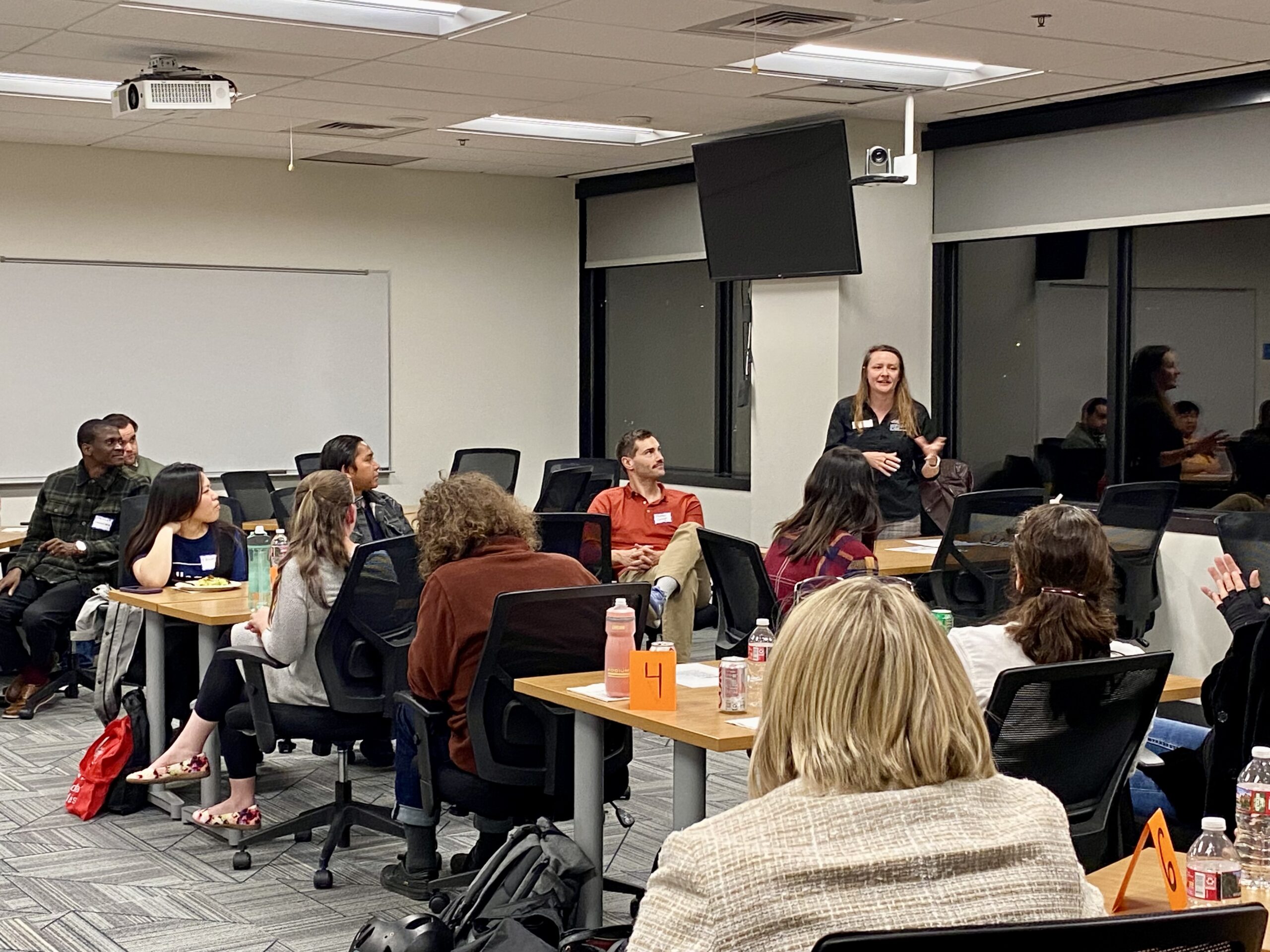 MPAcc Spring '26 Orientation - classroom shot of students looking back at a faculty member introducing themselves
