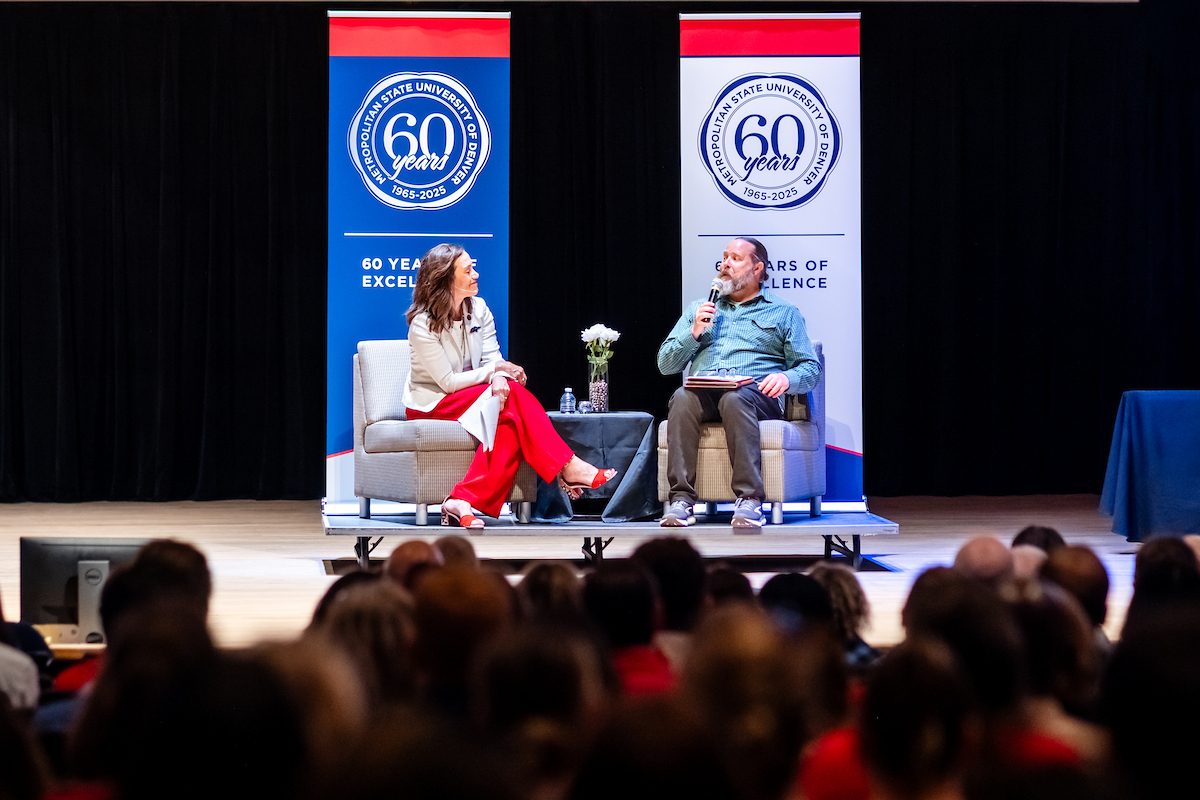 Provost Matthew S. Makley, Ph.D. and President Janine Davidson, Ph.D. speaking on stage.