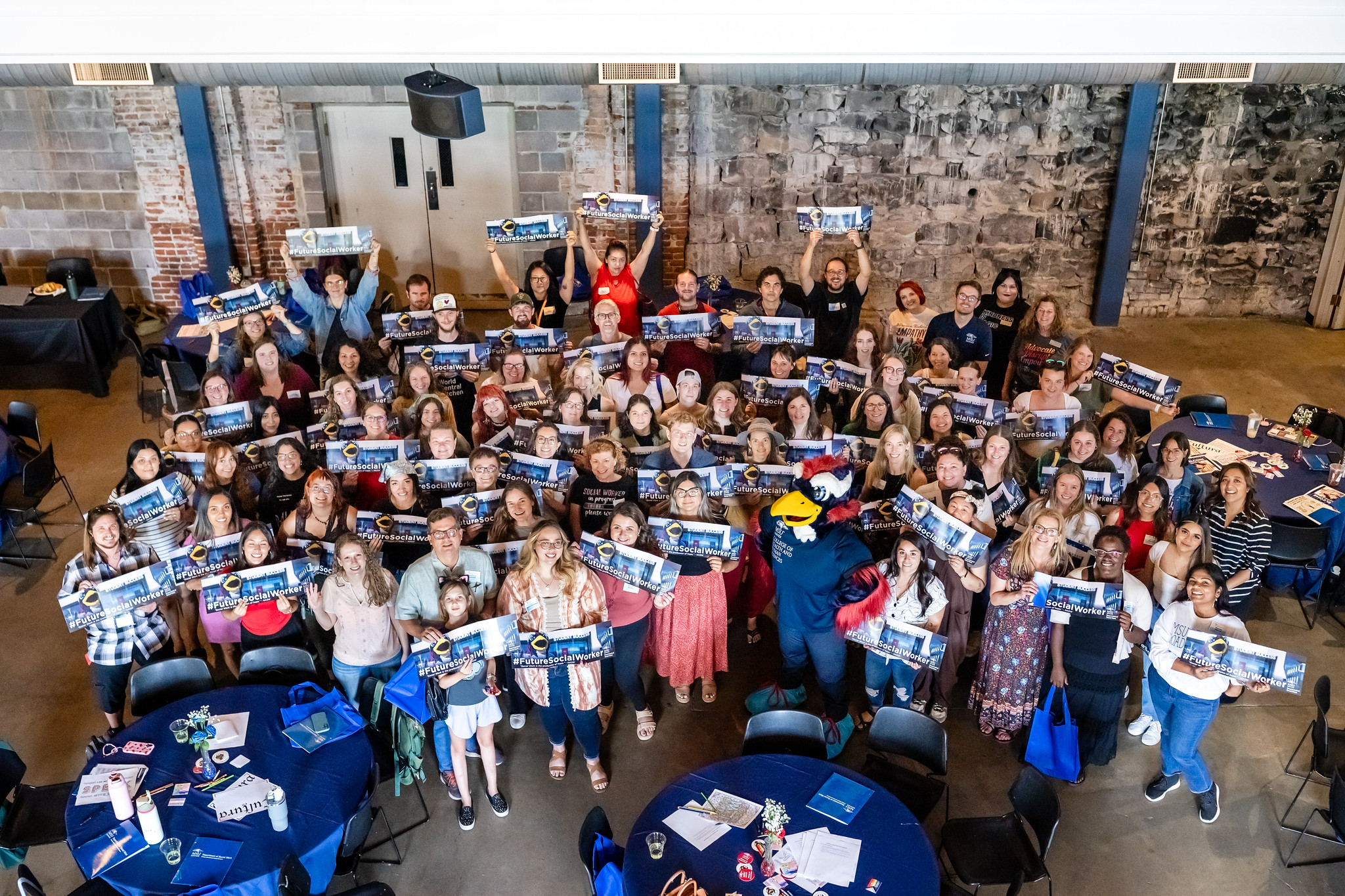 MSU Denver social work students gathered together with signs that say future social worker
