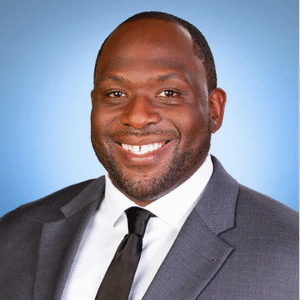 Headshot of Justin Adams