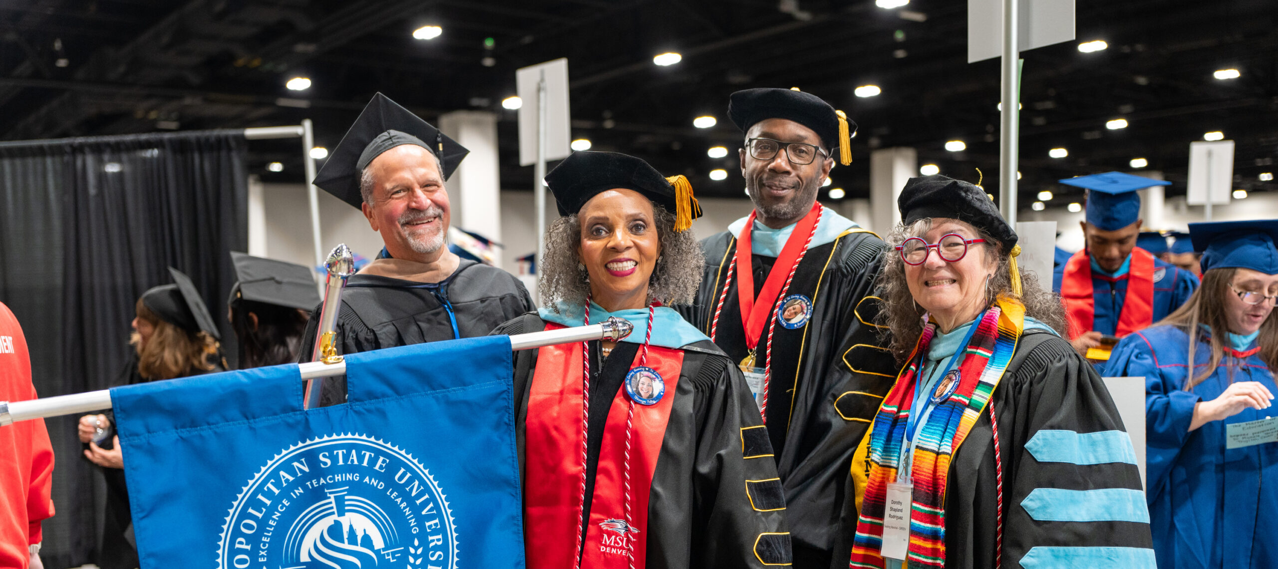 Department Chairs and Marshals prepare to walk graduates to the commencement floor.