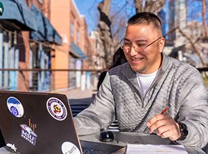 MSU Denver student Adam Nakamura juggles work, a student leadership position, parenthood and online courses.